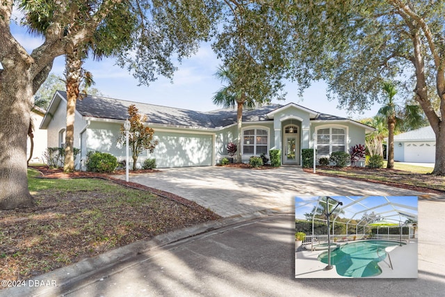 single story home featuring a patio and a lanai