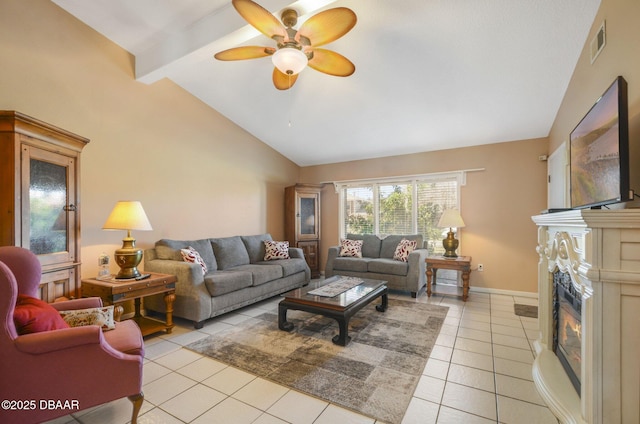 living room with visible vents, lofted ceiling with beams, a glass covered fireplace, light tile patterned flooring, and baseboards