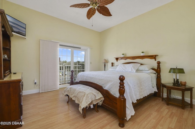 bedroom featuring access to exterior, light wood finished floors, a ceiling fan, and baseboards