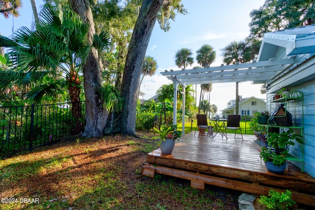 view of yard with a pergola and a deck