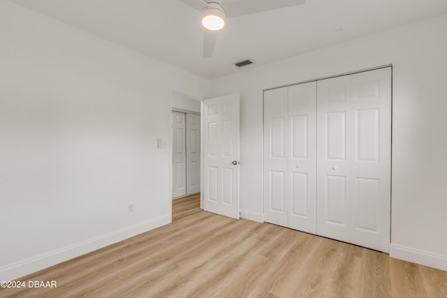 unfurnished bedroom featuring light hardwood / wood-style floors and ceiling fan