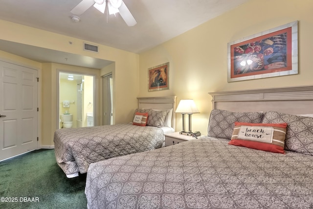 bedroom featuring ensuite bath, carpet flooring, visible vents, and ceiling fan