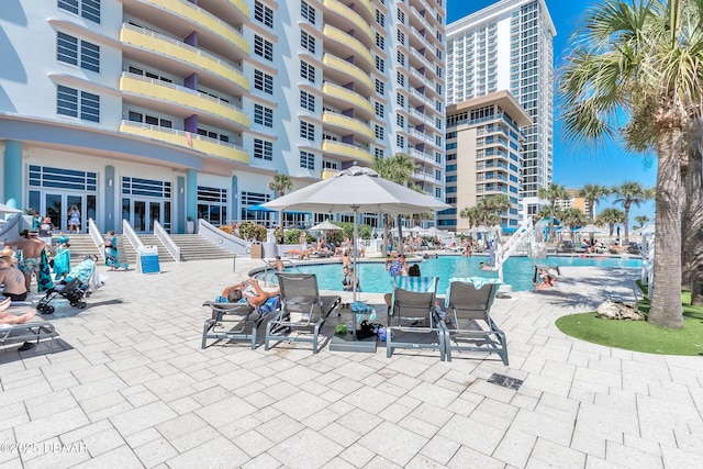 pool with a patio area