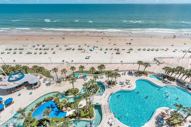 aerial view with a beach view and a water view