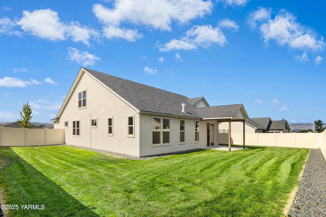 201 E Chinook Rd Lot # 10, Ellensburg, WA 98926 - rear view of property featuring stucco siding, a shingled roof, and a patio area