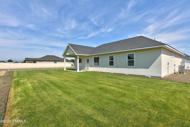 4608 W Larch Ave, Yakima, WA 98908 - rear view of house with stucco siding and a shingled roof