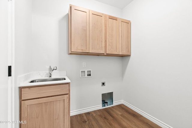 4608 W Larch Ave, Yakima, WA 98908 - laundry area with cabinet space, dark wood-style flooring, electric dryer hookup, and hookup for a washing machine