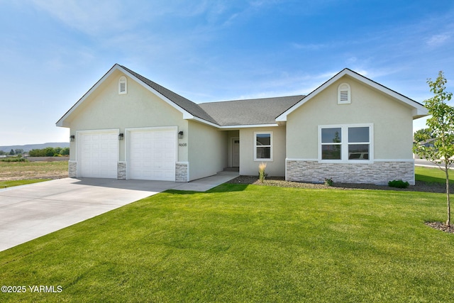 4608 W Larch Ave, Yakima, WA 98908 - ranch-style house with stone siding, a garage, stucco siding, and a front yard