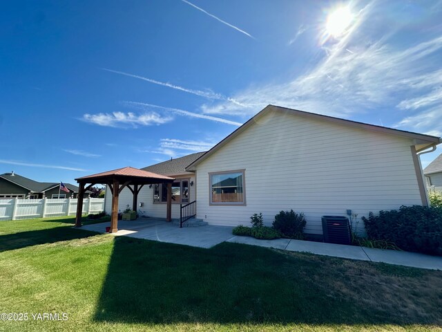 1010 S 89th Ave, Yakima, WA 98908 - back of house featuring a gazebo, a patio area, and cooling unit