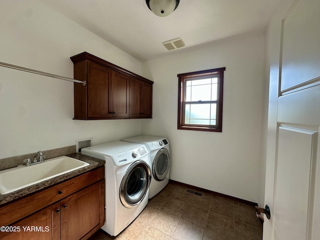 1010 S 89th Ave, Yakima, WA 98908 - laundry room featuring cabinet space, washer and dryer, and baseboards