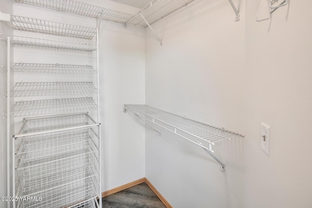 23812 21st Dr Unit Se, Bothell, WA 98021 - spacious closet featuring wood finished floors