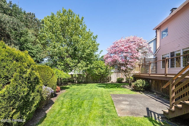 23812 21st Dr Unit Se, Bothell, WA 98021 - view of yard featuring stairs, a fenced backyard, a wooden deck, and a patio
