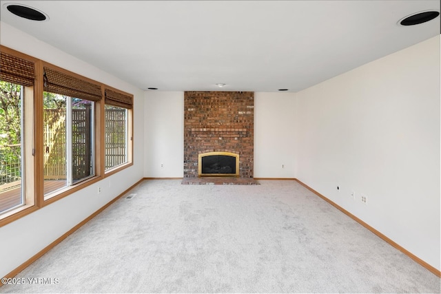 23812 21st Dr Unit Se, Bothell, WA 98021 - unfurnished living room featuring baseboards, a wealth of natural light, and carpet