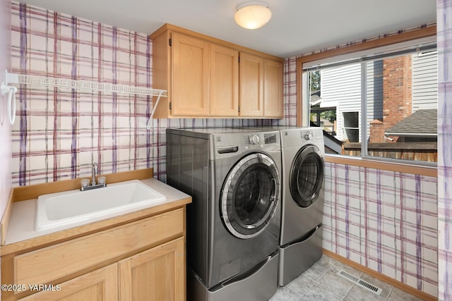 23812 21st Dr Unit Se, Bothell, WA 98021 - clothes washing area with separate washer and dryer, a sink, and wallpapered walls