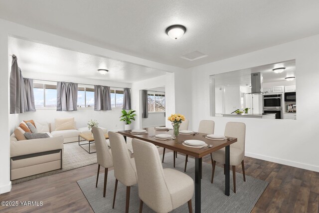 12307 Tieton Dr, Yakima, WA 98908 - dining room with plenty of natural light, dark wood-type flooring, baseboards, and a textured ceiling