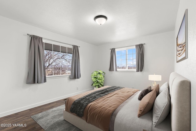 12307 Tieton Dr, Yakima, WA 98908 - bedroom featuring wood finished floors and baseboards