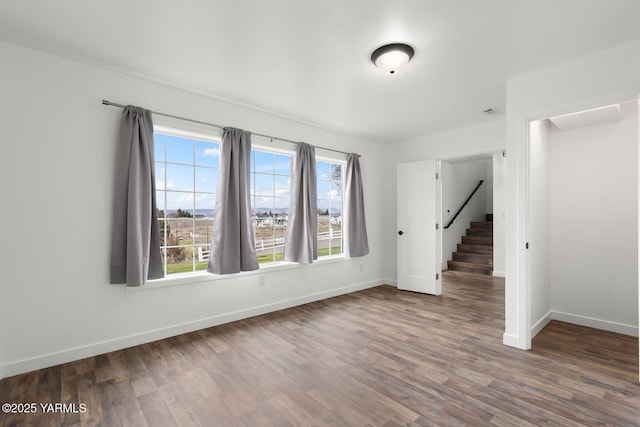 12307 Tieton Dr, Yakima, WA 98908 - empty room with baseboards and wood finished floors