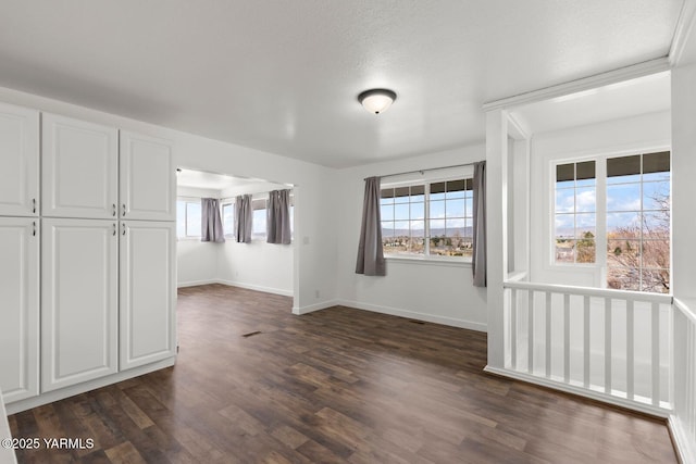 12307 Tieton Dr, Yakima, WA 98908 - unfurnished room featuring dark wood finished floors and baseboards