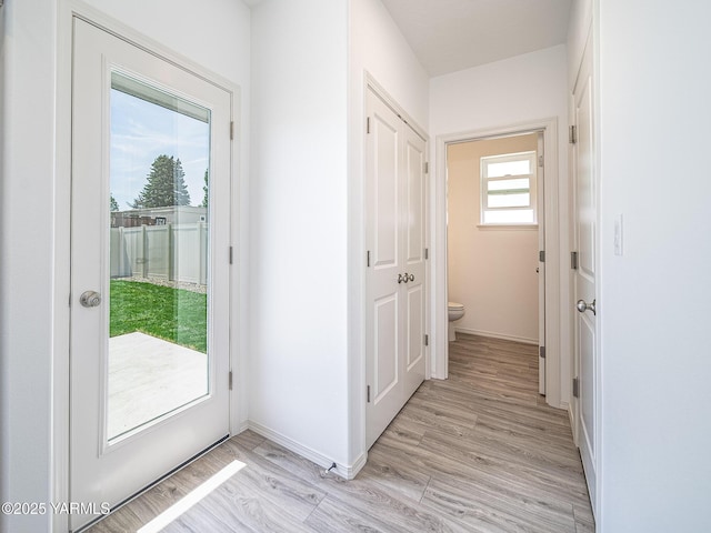 4700 W Oak Ave, Yakima, WA 98903 - doorway with light wood-type flooring and baseboards