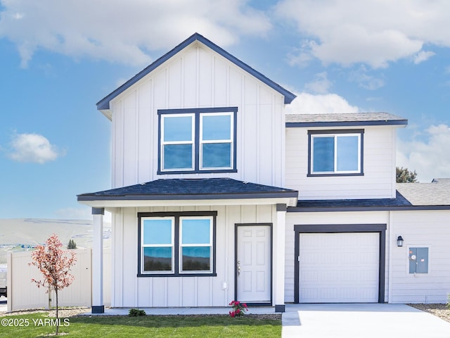 4700 W Oak Ave, Yakima, WA 98903 - view of front of home with board and batten siding, roof with shingles, and a garage