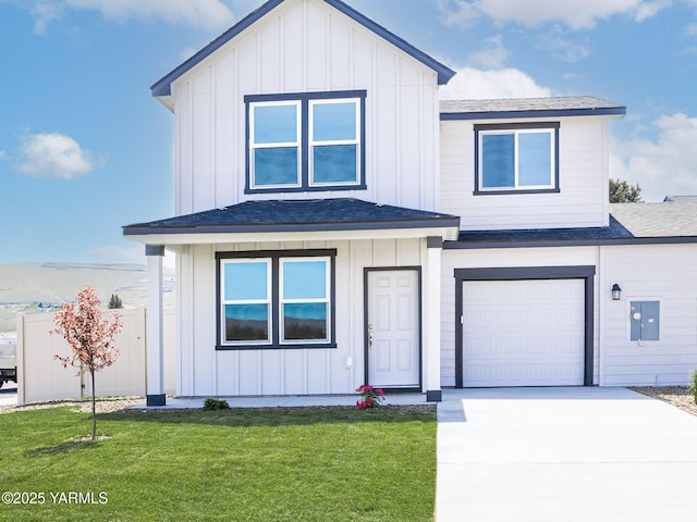 4700 W Oak Ave, Yakima, WA 98903 - view of front facade featuring board and batten siding, a shingled roof, and driveway