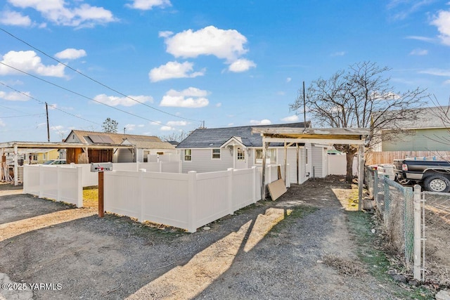 view of front of home with fence