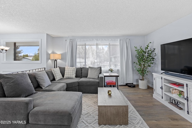4704 W Prasch Ave, Yakima, WA 98908 - living area featuring a textured ceiling, wood finished floors, and plenty of natural light