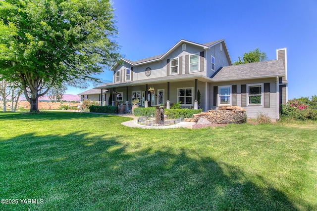 11901 Zier Rd, Yakima, WA 98908 - back of property with a lawn and a chimney