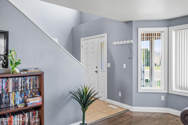506 Millenium Ave, Moxee, WA 98936 - entryway with healthy amount of natural light and wood finished floors
