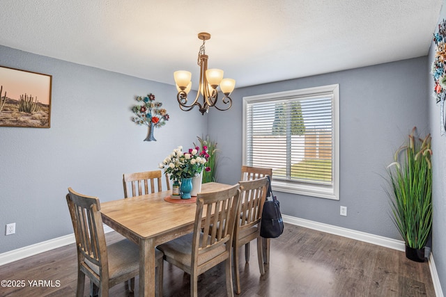 506 Millenium Ave, Moxee, WA 98936 - dining room featuring a chandelier and wood finished floors