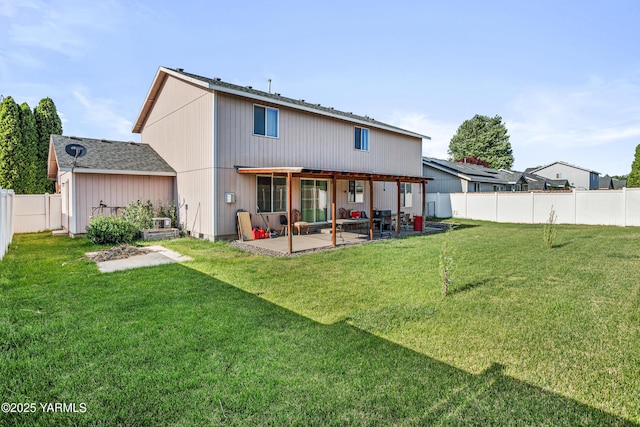 506 Millenium Ave, Moxee, WA 98936 - back of house with a patio and a fenced backyard