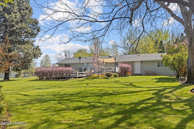 10401 N 1739th Pr NW, Grandview, WA 98930 - rear view of house featuring a wooden deck and a yard