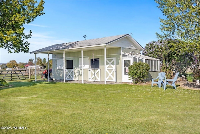 10401 N 1739th Pr NW, Grandview, WA 98930 - rear view of property with an outbuilding and an exterior structure
