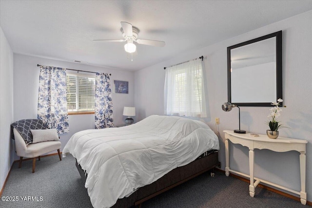 10401 N 1739th Pr NW, Grandview, WA 98930 - carpeted bedroom with a ceiling fan and multiple windows