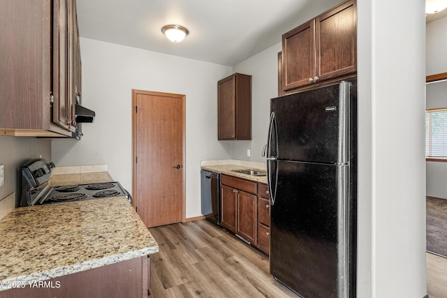 3101 Swan Ave, Yakima, WA 98902 - kitchen with black appliances, ventilation hood, and light wood-type flooring