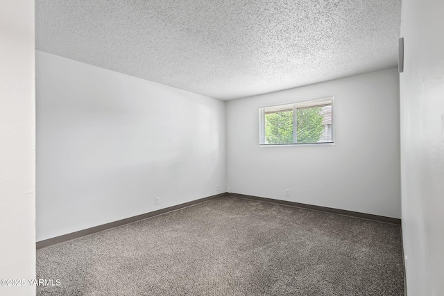 904 S 42nd Ave Unit A, B, C, D, Yakima, WA 98908 - carpeted empty room with a textured ceiling and baseboards