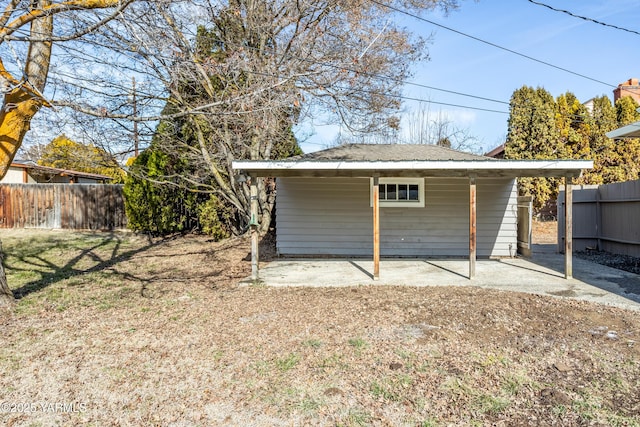 garage with fence