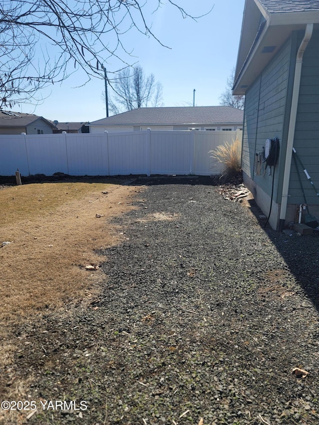 view of yard featuring fence