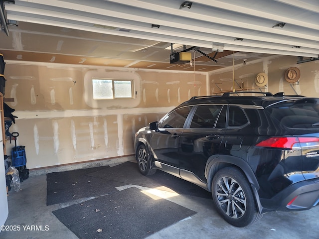 garage featuring a garage door opener