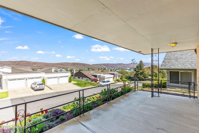 balcony with a mountain view and a residential view