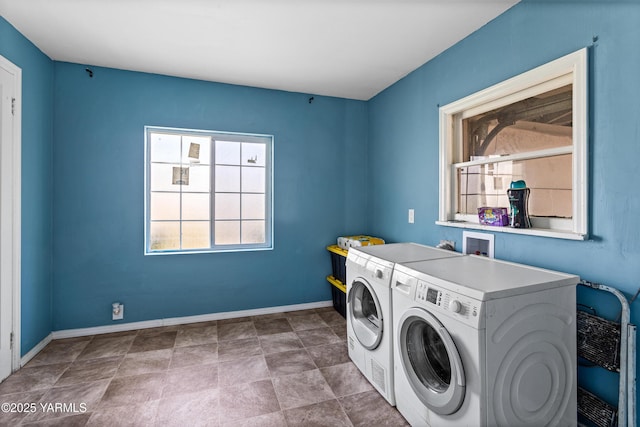 1510 Hathaway St, Yakima, WA 98902 - laundry area with washer and dryer, laundry area, baseboards, and a wealth of natural light