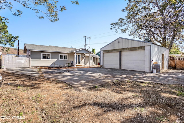 1510 Hathaway St, Yakima, WA 98902 - exterior space with a garage, fence, and an outbuilding