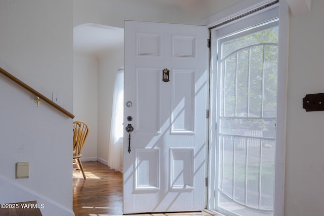 418 S 32nd Ave, Yakima, WA 98902 - foyer with arched walkways, wood finished floors, and baseboards
