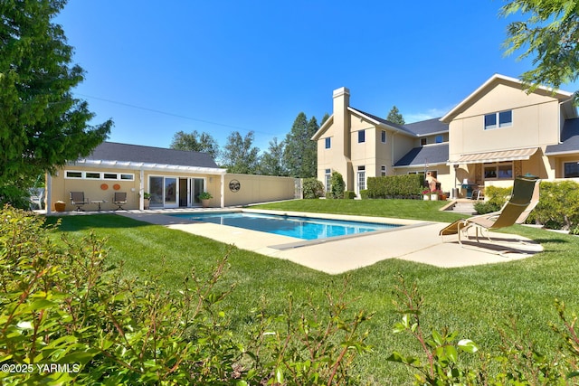 1011 N 79th Ave, Yakima, WA 98908 - outdoor pool featuring a patio area and a yard