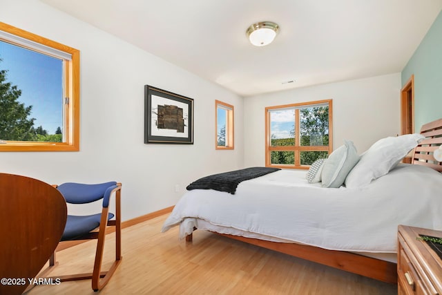 1011 N 79th Ave, Yakima, WA 98908 - bedroom with wood finished floors and baseboards