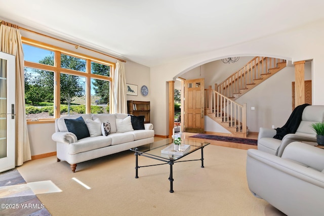 1011 N 79th Ave, Yakima, WA 98908 - living area with arched walkways, baseboards, and stairs