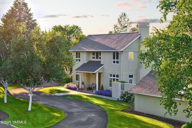 1011 N 79th Ave, Yakima, WA 98908 - traditional-style house with a chimney and stucco siding