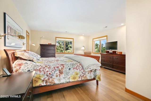 1011 N 79th Ave, Yakima, WA 98908 - bedroom with wood finished floors, baseboards, and recessed lighting