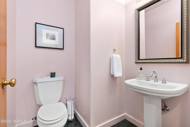 1011 N 79th Ave, Yakima, WA 98908 - bathroom with toilet and baseboards