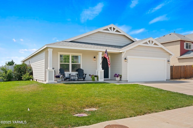212 Golding St, Moxee, WA 98936 - view of front facade featuring covered porch, driveway, a garage, and a shingled roof